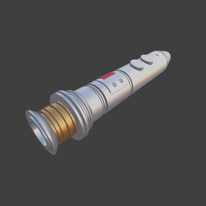 May include: A silver lightsaber with a gold-colored handle and a red button. The lightsaber is a toy prop.