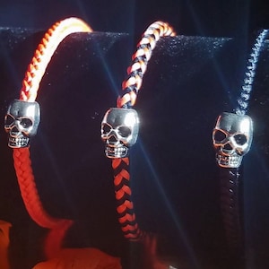 Halloween Skull Bracelet: Hand-woven satin thread square braid in black, orange or mixed with a silver skull bead and silver magnetic clasp.