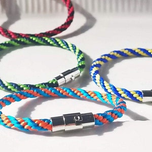 Sports Team bracelets in custom colors: Hand-woven satin thread with your team colors & silver magnetic/pin clasp. Choose 2 from 28 colors!
