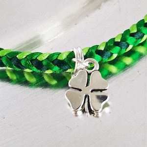 St Patrick&#39;s Day bracelet, lucky charm bracelet, hand-woven satin thread braid in green color mix w/ silver 4-leaf clover charm & hook clasp