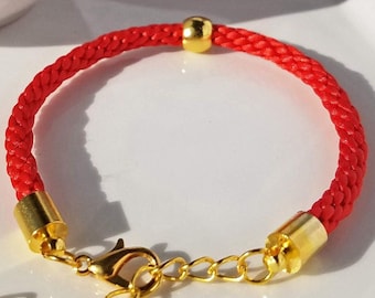 Chinese New Year bracelet, hand-woven red satin thread with a round gold-plated bead and matching adjustable clasp. Custom colors available!