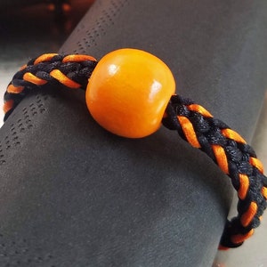 Cincinnati football party napkin rings, hand-woven mix of threads in orange & black w/ an orange wooden round accent bead, set of 2, 4 or 6.