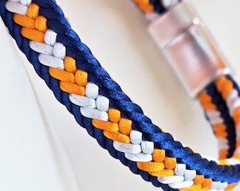 Pulsera Denver: tejida a mano con los colores del equipo de los Broncos, con cierre magnético, tamaños y colores personalizados.