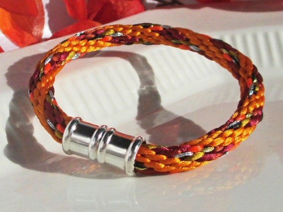 Asian Mid-autumn Festival Bracelet: Hand-woven Satin Thread in a Mix of  Orange & Warm Fall Colors With a Bamboo-shaped Silver Magnetic Clasp - Etsy