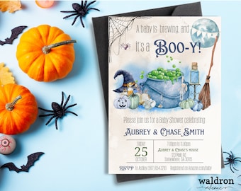May include: Halloween themed baby shower invitation with a blue cauldron, green potion, and a witch's hat. The text reads "A baby is brewing, and it's a Boo-Y!" and "Please join us for a Baby Shower celebrating Aubrey & Chase Smith".