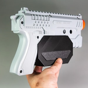 fondina per pistola luminosa sinden,
