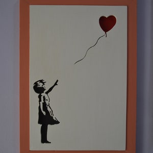 Banksy Tribut, perforierte Baby-Malerei mit Ballon