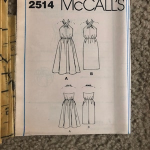 McCalls 2514 Cross Over Bodice Halter Dress Flared Straight Skirt women sewing sz 8 Vintage Uncut sewing pattern instruction NO ENVELOPE