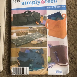 May include: Simplicity pattern number 4535, titled "simply*teen" for totes and organizers. The pattern includes instructions for making a variety of bags, including a duffel bag, a tote bag, and a smaller bag with a flap.