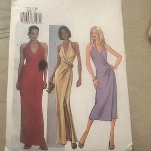 May include: A sewing pattern for a halter dress. The pattern is for sizes 12, 14, 16. The pattern is from Butterick and is labeled "Fast & Easy".