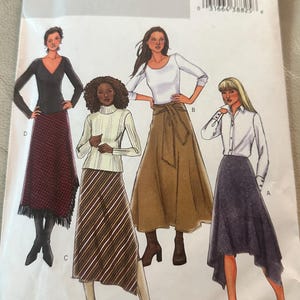 May include: A sewing pattern for four different skirts. The pattern is from Butterick and the pattern number is B4348. The skirts are shown on four different models. The skirts are all different styles and lengths. The skirts are all in different colors and patterns.