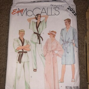May include: A sewing pattern for a robe and pajamas. The pattern is for sizes small petite. The pattern is from McCall's Easy and is for the year 2022.