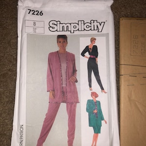 May include: Simplicity sewing pattern envelope for a jacket and pants set. The pattern is size 8, European size 36. The envelope shows a model wearing a pink jacket and pants set, a black jumpsuit, and a green jacket and skirt set.