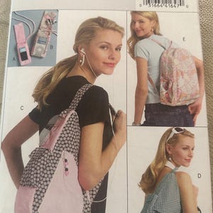 May include: A sewing pattern for a backpack with a floral print. The pattern includes instructions for making a small pouch for a phone or other small items. The pattern number is B5054.
