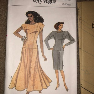 May include: A sewing pattern for a dress with two different styles. The pattern is for sizes 8-10-12. The pattern is called "Very Easy Very Vogue" and the pattern number is 9939.