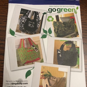 May include: Simplicity sewing pattern number 2597, "go green" with this pattern for making five different tote bags. The pattern includes instructions for making a black and white polka dot tote bag, a camouflage tote bag, a red and green floral tote bag, a black tote bag, and a beige tote bag.