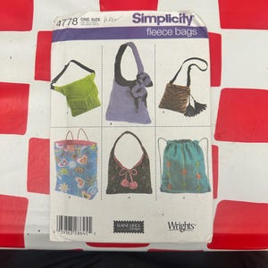 May include: A Simplicity 4778 sewing pattern envelope for fleece bags. The front displays six illustrations of various bag styles, including a green fringed bag, a purple bag with floral accents, a brown animal print bag, and a blue heart-patterned tote.
