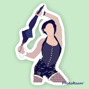 May include: A woman in a black and white costume holds a blue and white umbrella above her head. She is wearing a black corset with white trim and a black and white skirt. She is also wearing fishnet stockings and white shoes.