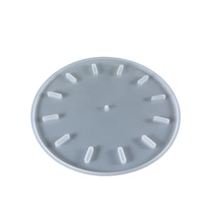 May include: A clear silicone mould shaped like a clock face with 12 indentations for resin.