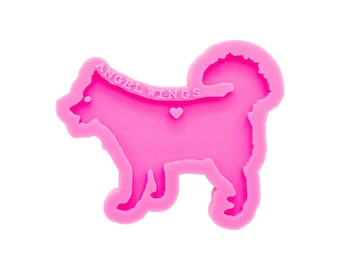 May include: Pink silicone mold shaped like a dog with the text "ANGEL WINGS" on the collar.