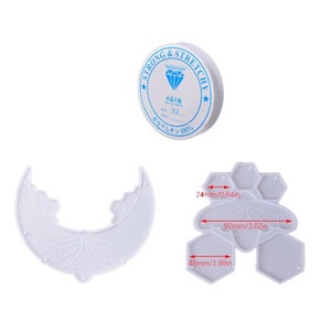May include: White silicone mould for resin casting featuring a bee design with hexagonal compartments. The mould measures 9.2cm wide, 4.8cm long, and 2.4cm tall.