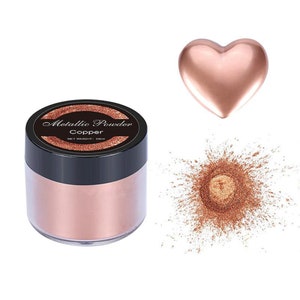 May include: A small jar of metallic copper powder. The jar is labeled "Metallic Powder Copper" and has a net weight of 20ml. A heart-shaped pile of the powder is shown next to the jar.