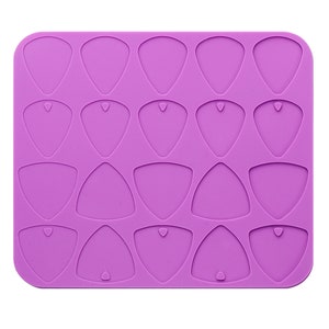 May include: A purple silicone mould with 20 cavities for making guitar pick-shaped resin crafts.