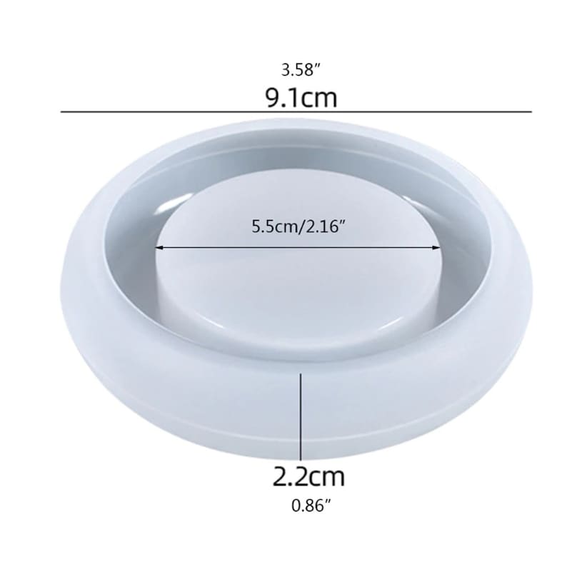 May include: A white, circular mold with a raised center and a surrounding rim. The mold measures 3.58 inches (9.1 cm) in diameter, with the center section measuring 2.16 inches (5.5 cm) across. The height is 0.86 inches (2.2 cm).
