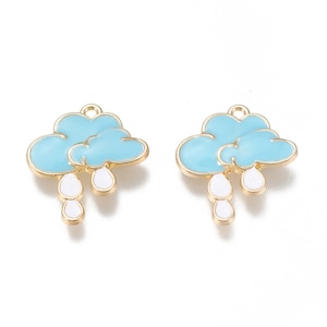 May include: Two cloud-shaped charms with a light blue enamel finish and gold-coloured trim. Each charm features white teardrop-shaped rain droplets. These charms are designed with a loop at the top for easy attachment to jewellery or other crafts.