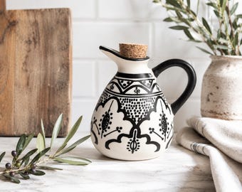 Bottiglia per olio in ceramica nera floreale