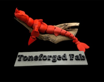 Articulated 3D printed Red Bluster, flexi sea monster, fidget toy, Seabeast Movie