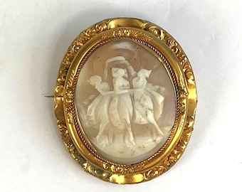 Large carved cameo featuring the Three Graces set in an ornate pinchbeck mount.C1880.