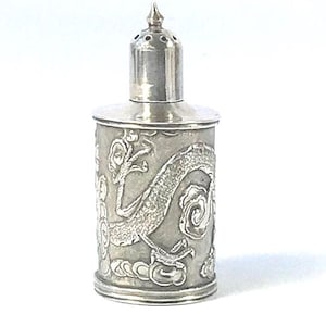 A Chinese Export Silver Pepper Pot with Chased Dragon and Scrolling Clouds. Hallmarks to Base.