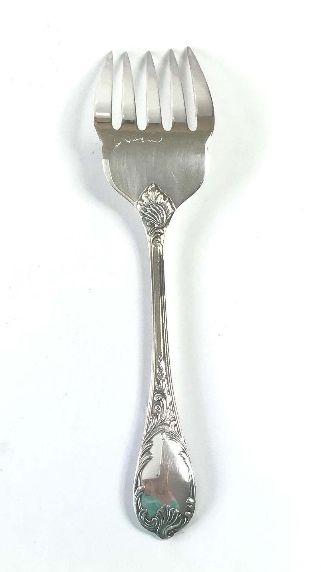 ヴィンテージのクリストフル サービング フォーク。シルバー プレート