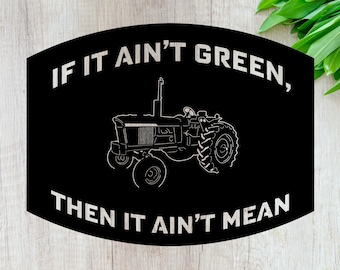 Puede incluir: Un letrero de metal negro y blanco con la silueta de un tractor y el texto "If it ain't green, then it ain't mean."