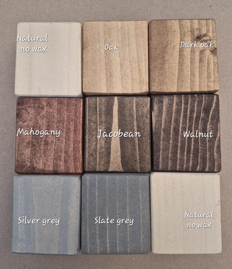 May include: Nine wooden squares showcasing different wood stain colors. Colors include Natural no wax, Oak, Dark oak, Mahogany, Jacobean, Walnut, Silver grey, Slate grey, and Natural no wax. Each square has the color name printed on it.