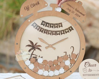 May include: A wooden retirement clock with the words "Happy Retirement" and "Off Clock" engraved. The clock features a beach scene and a space for guests to sign. Includes a small wooden box and a sign that says "Cheer to Retirement".