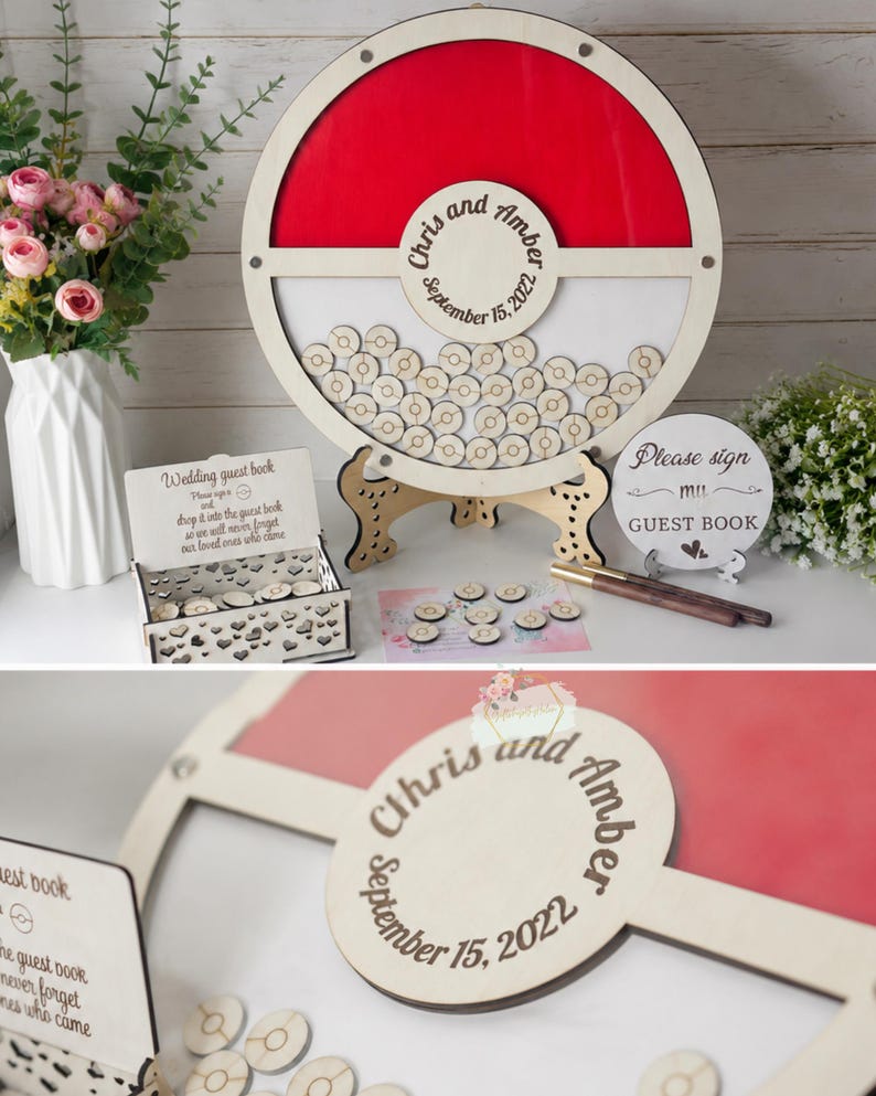 Puede incluir: Un libro de visitas de boda de madera con un dise&ntilde;o rojo y blanco. El marco circular tiene una secci&oacute;n para que los invitados firmen peque&ntilde;as fichas de madera. Los nombres "Chris and Amber" y la fecha "15 de septiembre de 2022" est&aacute;n grabados.