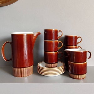 Beautiful and practical six person Poole Compact coffee set in the chestnut colourway. One of Robert Jefferson's most considered designs.