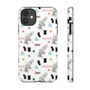 May include: White iPhone case with a repeating pattern of a map of Guam, the words "Chamorro" and "Saipan", and various other symbols. The case has a black border.