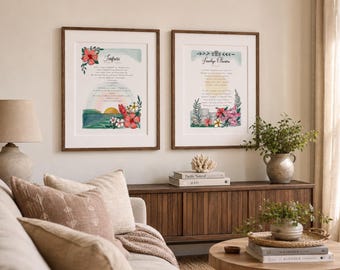 May include: Two framed wall art prints featuring watercolor illustrations of tropical flowers, greenery, and sunset landscapes with printed text. The left print displays the title "Impresi" and the right print displays the title "Fundo Ouro".