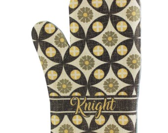 May include: An oven mitt with a geometric pattern in brown, yellow, and olive green. The design features intersecting circles and floral motifs. The word "Knight" is printed in gold script across a brown band.