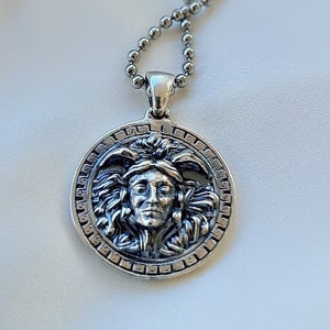 Handmade Greek Goddess Pendant  - sterling silver pendant captures the essence of Gorgon Medusa with an intricate design.