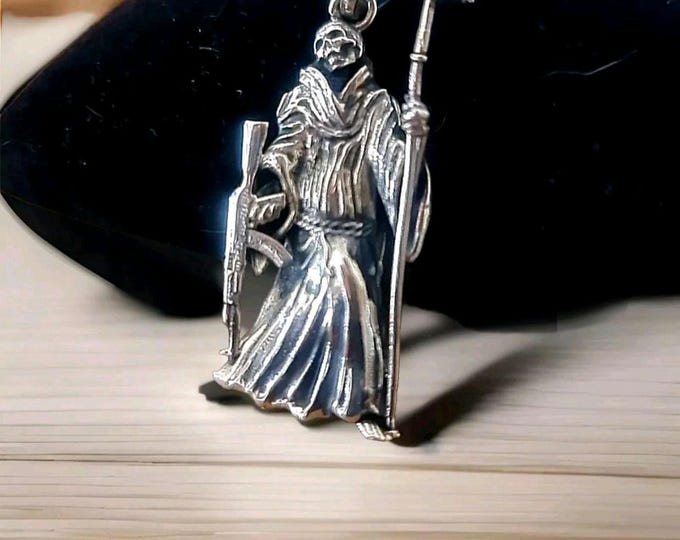 La Santa Muerte 925 Sterling Silver pendant holding a Cross and a Gun - 5CM ( 2 INCHES )