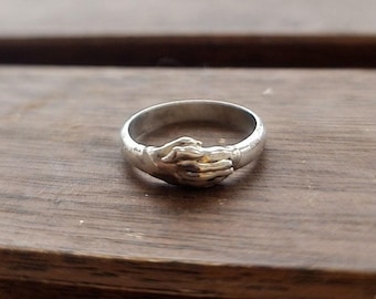 Sterling Silver Holding Hands Ring: Romantic Love Symbol