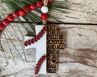 May include: Wooden baseball cross ornament with red stitching and the text "Let the field be joyful and all that is in it Psalm 96:12".