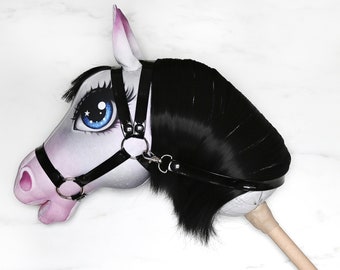 Hobby horse, a horse on a stick with black mane