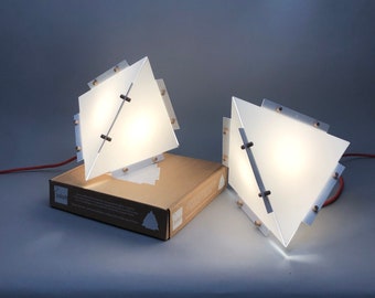 White Nordic design pendant light. Easy to assemble origami style light fixture. Eco-friendly multipurpose lamp to hang or place. Zen light.