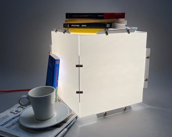 Minimalist design table lamp. Nice mood light. Creative interior decoration. Eco-friendly multi-purpose table lamp or pendant light.