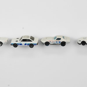 Low Profile Hot Wheels Compatible Wall Display for 1/64 Scale Cars | Floating Car Wall Mounts for Hot Wheels & Matchbox | Set of 20